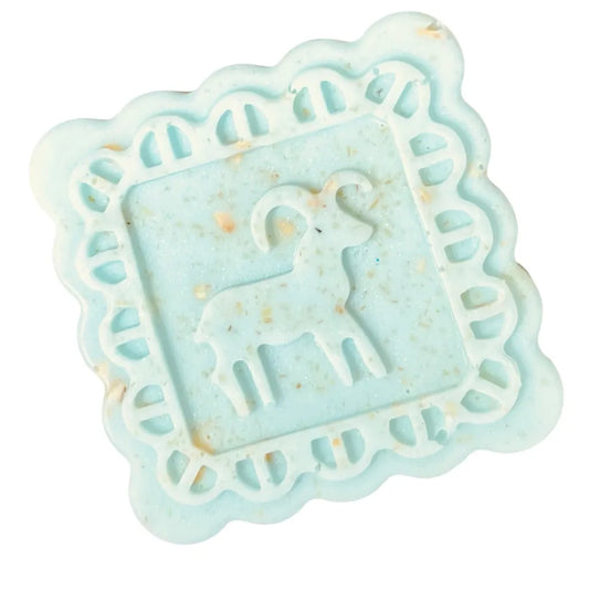 Light blue soap with a deer design on a white background